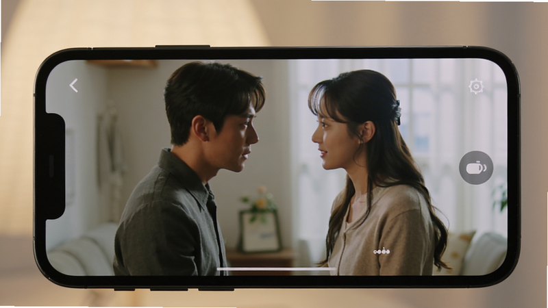 Red��TV ad-free viewing experience, close-up of a smartphone screen playing a short drama scene, no banner ads visible, clear HD video quality, minimal UI elements, focus on the content, soft lighting
