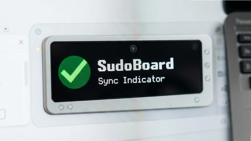 SudoBoard sync status indicator with green checkmark, clean UI design