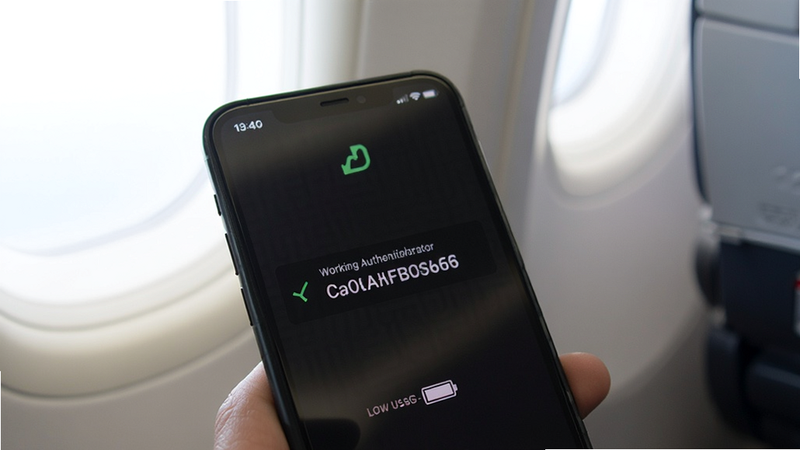 Smartphone in airplane mode displaying a working authenticator code, battery icon showing low usage, minimalist tech style, clean background, focus on efficiency