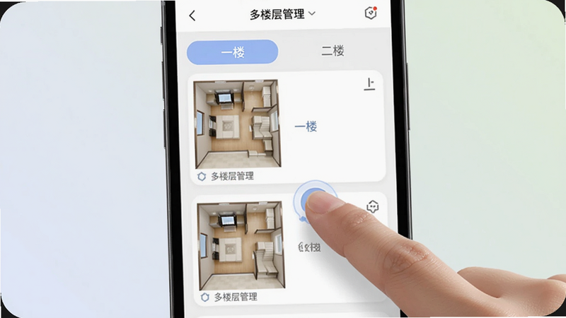 Roborock App多楼层地图管理界面,主体为手机屏幕,显示两个楼层缩略图列表,布局上下排列,用户手指正在点击切换楼层,界面有“一楼”、“二楼”标签,风格简约,色彩柔和,画质清晰,文字标注“多楼层管理”